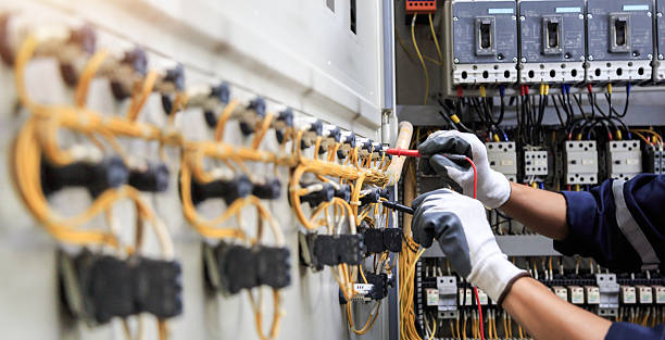 Professional Electrician technician working in Palmetto Estates, FL